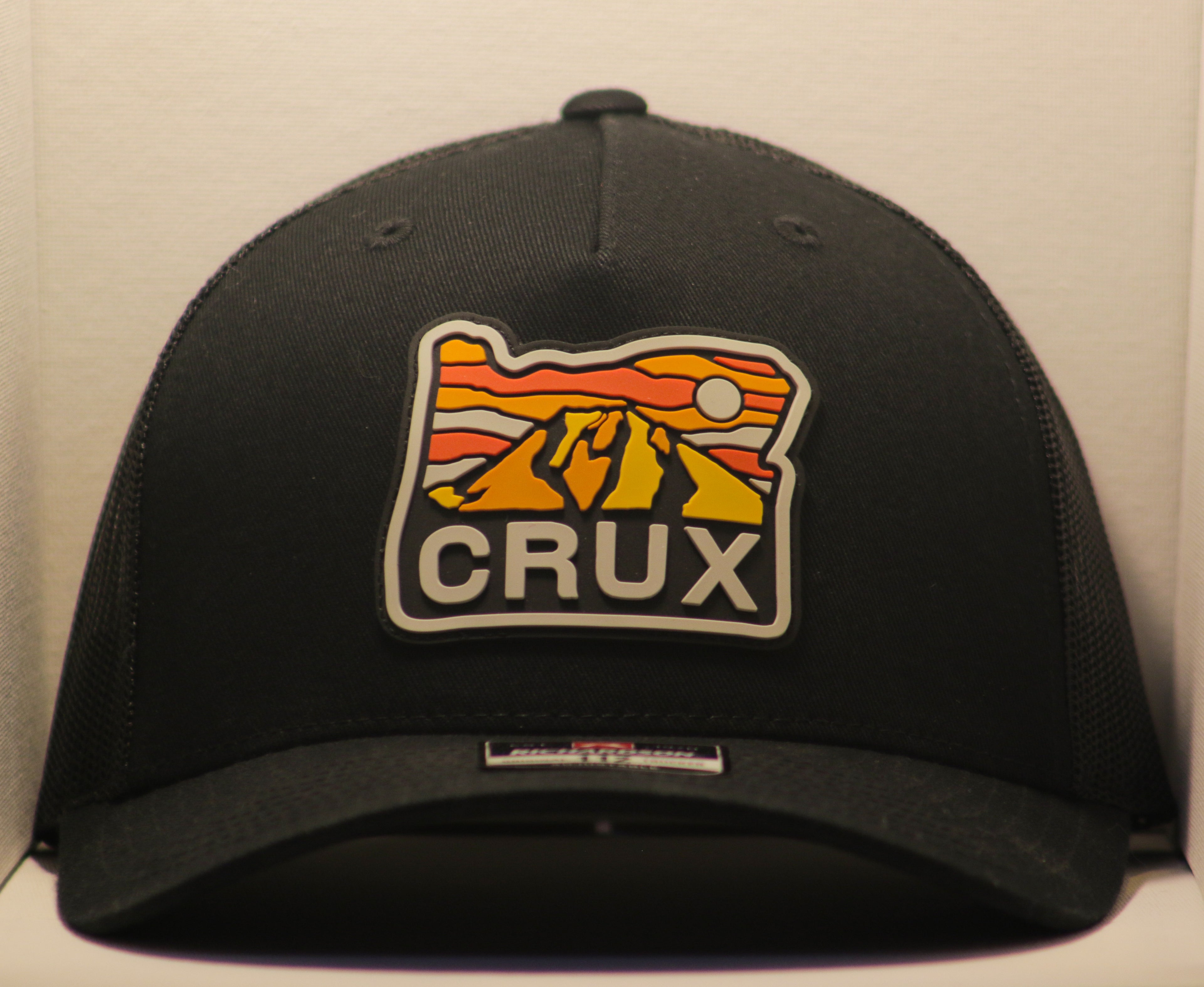 Black Rubber Patch Trucker Hat
